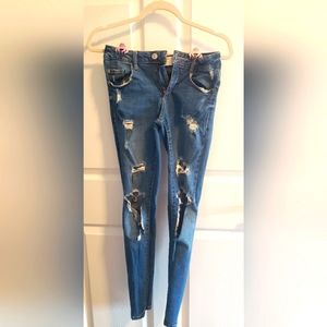 Skinny jeans with holes from Garage